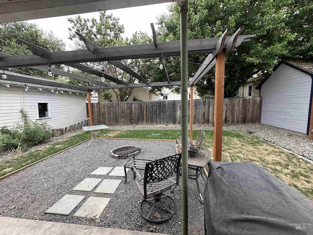 821 3rd St, Lewiston, ID 83501 - view of patio / terrace featuring a fire pit and a pergola