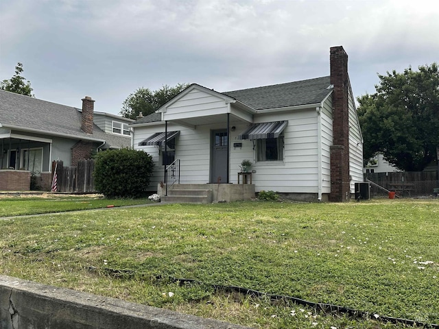821 3rd St, Lewiston, ID 83501 - bungalow featuring a chimney and a shingled roof