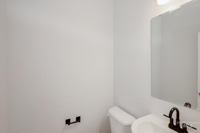 5011 S Amorita Ave, Meridian, ID 83642 - bathroom featuring toilet and a sink