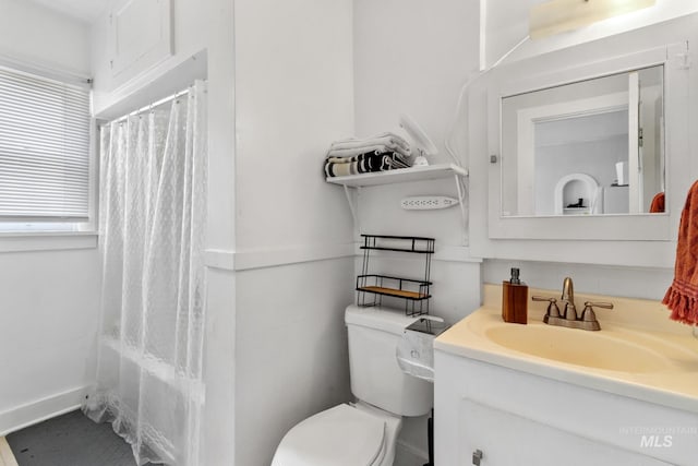 full bath featuring toilet, shower / tub combo, and vanity