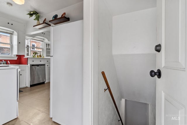 kitchen with white cabinetry and dishwasher