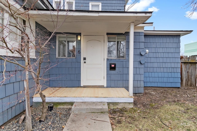 property entrance featuring fence