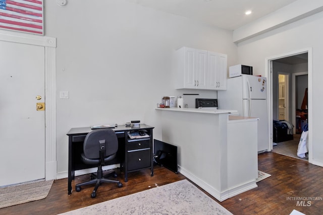 office featuring baseboards, dark wood-style flooring, and recessed lighting