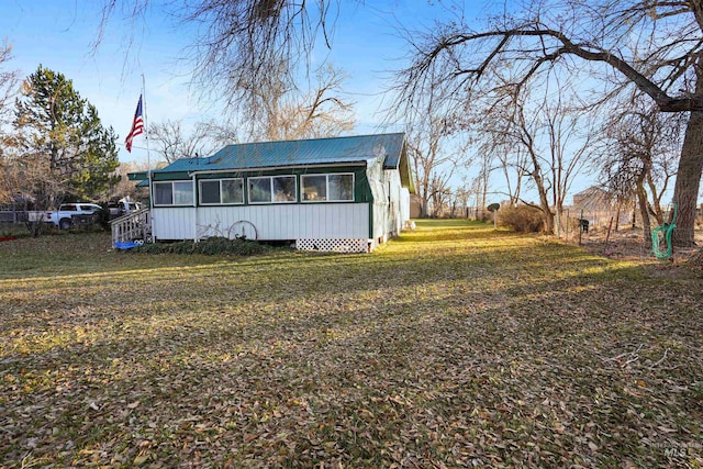 exterior space with a front lawn