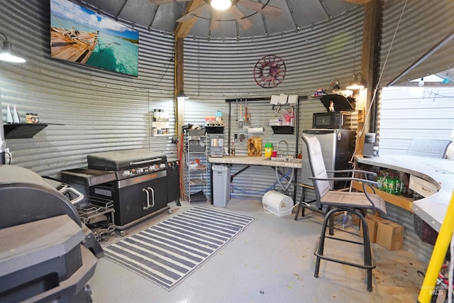 view of patio featuring area for grilling, ceiling fan, and sink