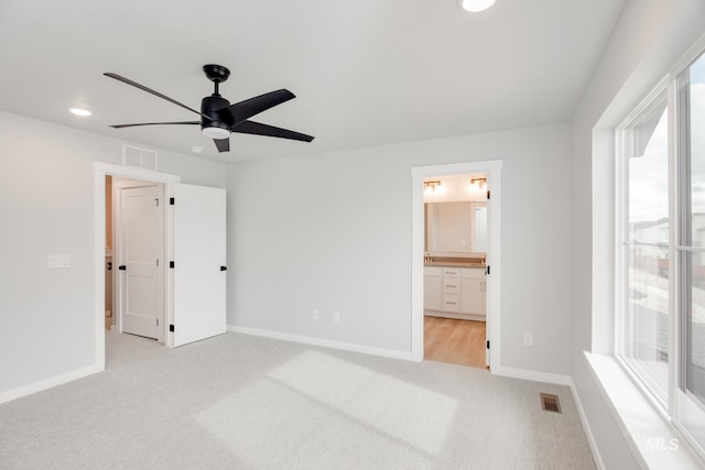 unfurnished bedroom with recessed lighting, visible vents, baseboards, and light carpet