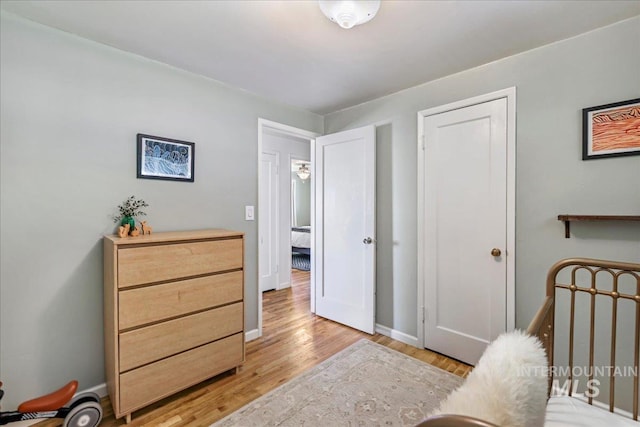 1984 11th Ave E, Twin Falls, ID 83301 - bedroom with light wood-type flooring and baseboards