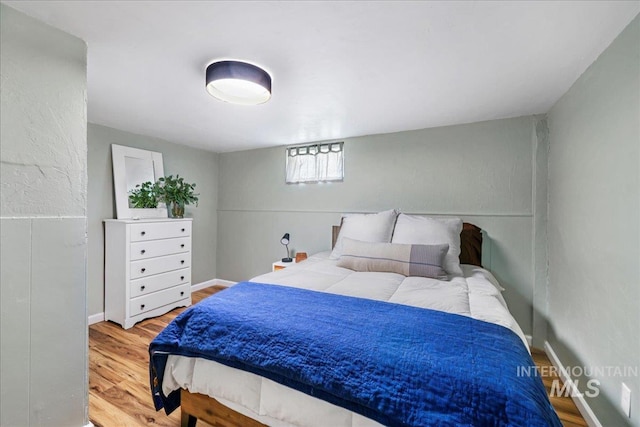 1984 11th Ave E, Twin Falls, ID 83301 - bedroom with wood finished floors and baseboards