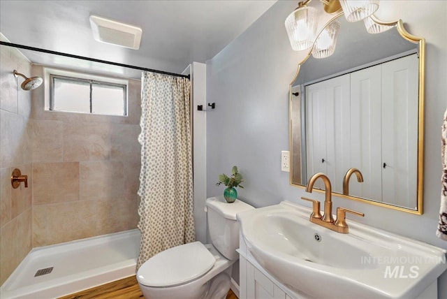 1984 11th Ave E, Twin Falls, ID 83301 - full bathroom with toilet, vanity, and a tile shower