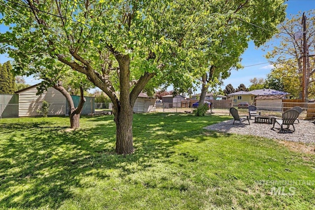 1984 11th Ave E, Twin Falls, ID 83301 - view of yard featuring a fire pit