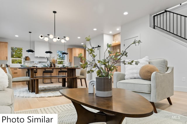 dining room featuring recessed lighting and light wood-style floors