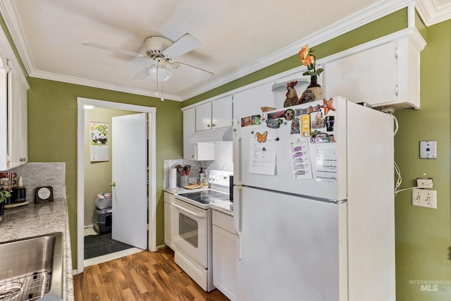 2819 Gemini, Caldwell, ID 83605 - kitchen featuring white appliances, decorative backsplash, light wood finished floors, white cabinets, and under cabinet range hood