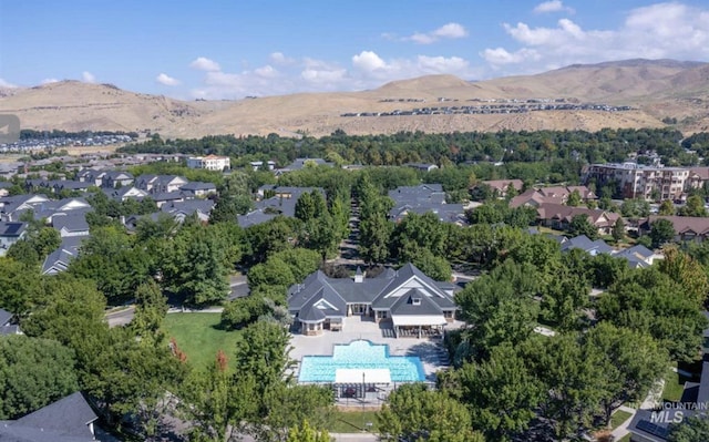 drone / aerial view featuring a mountain view