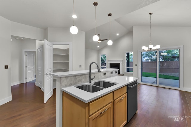 3742 N Heritage View Ave, Meridian, ID 83646 - kitchen featuring a sink, stainless steel dishwasher, light countertops, dark wood-type flooring, and high vaulted ceiling