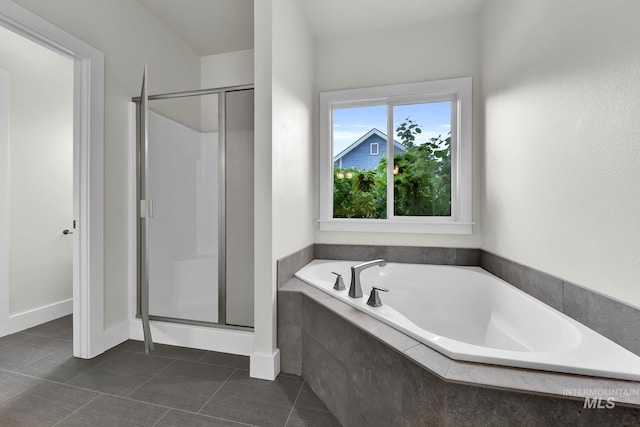 3742 N Heritage View Ave, Meridian, ID 83646 - bathroom featuring tile patterned flooring, a stall shower, and a garden tub