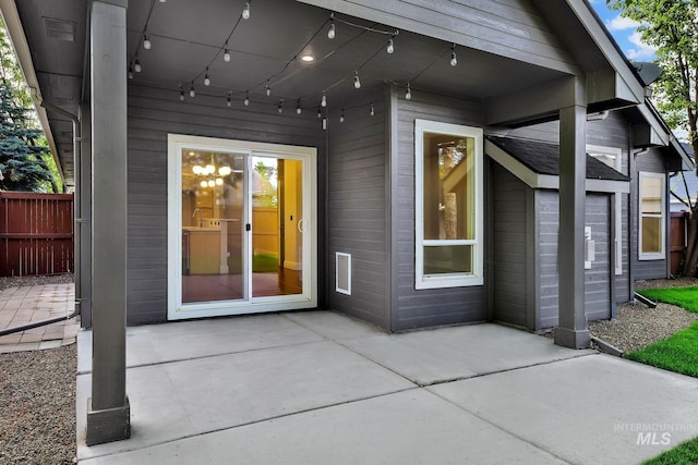 3742 N Heritage View Ave, Meridian, ID 83646 - doorway to property with a patio and fence