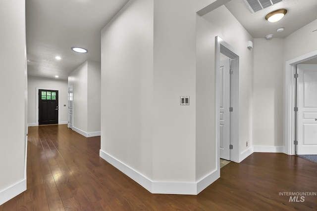 3742 N Heritage View Ave, Meridian, ID 83646 - hall with dark wood-type flooring, baseboards, and recessed lighting