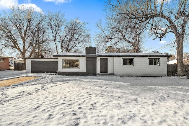 single story home with a garage