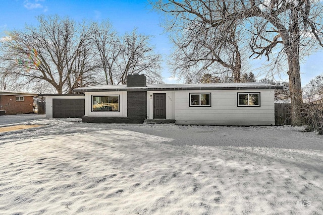 ranch-style home with a garage