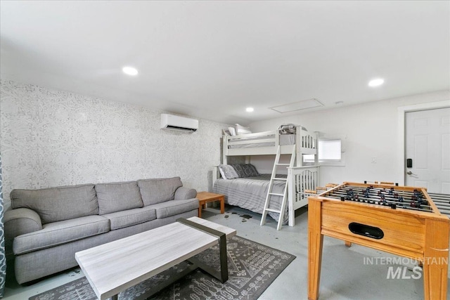 bedroom featuring concrete floors and a wall unit AC