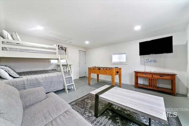 bedroom with concrete flooring