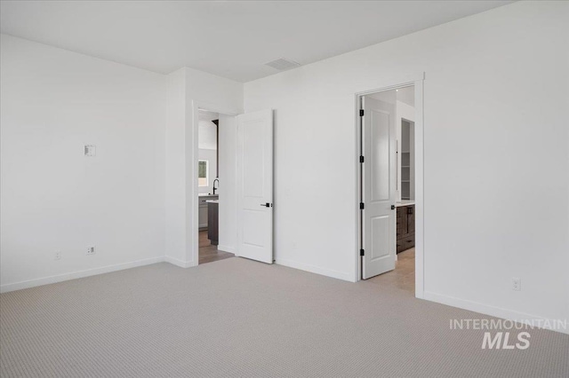 5278 W Mcnair St, Meridian, ID 83646 - unfurnished bedroom with light carpet and baseboards