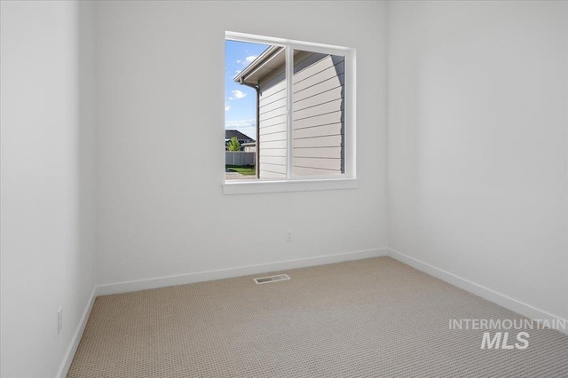 5278 W Mcnair St, Meridian, ID 83646 - empty room featuring carpet flooring and baseboards