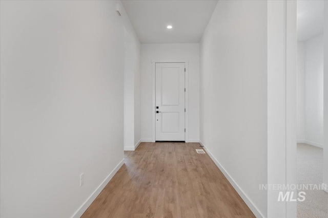 5278 W Mcnair St, Meridian, ID 83646 - corridor featuring light wood-style floors, baseboards, and recessed lighting
