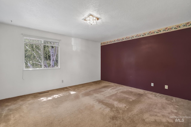 955 Bitterroot Pl, Twin Falls, ID 83301 - carpeted empty room featuring a textured ceiling