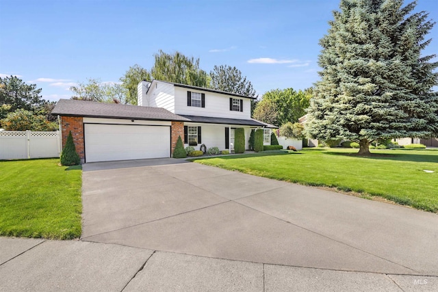 955 Bitterroot Pl, Twin Falls, ID 83301 - traditional-style home with brick siding, a garage, and concrete driveway