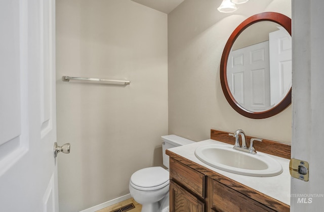 955 Bitterroot Pl, Twin Falls, ID 83301 - half bathroom with toilet and vanity
