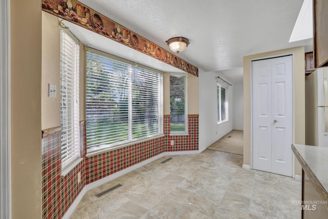 955 Bitterroot Pl, Twin Falls, ID 83301 - unfurnished dining area featuring plenty of natural light and baseboards