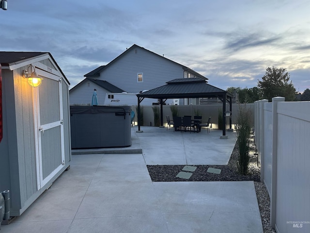 2982 W Mcintosh, Kuna, ID 83634 - fenced backyard with a patio, a gazebo, and a hot tub