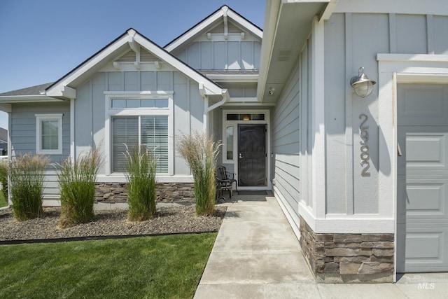 2982 W Mcintosh, Kuna, ID 83634 - doorway to property featuring board and batten siding