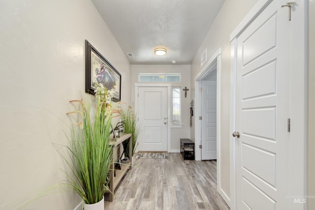2982 W Mcintosh, Kuna, ID 83634 - entrance foyer with light wood-type flooring and baseboards