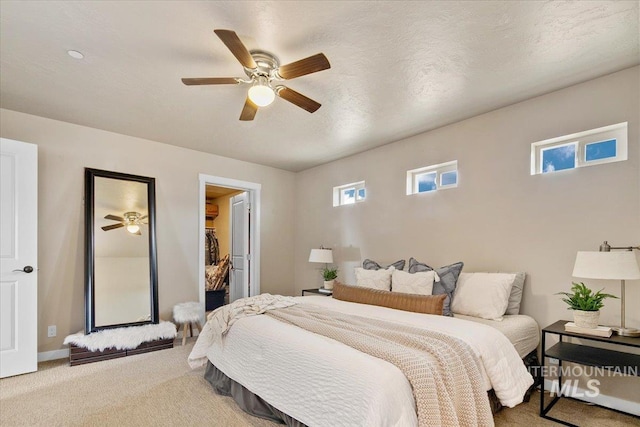 8618 Latimore Ln, Middleton, ID 83644 - bedroom with carpet, a spacious closet, a ceiling fan, and a closet