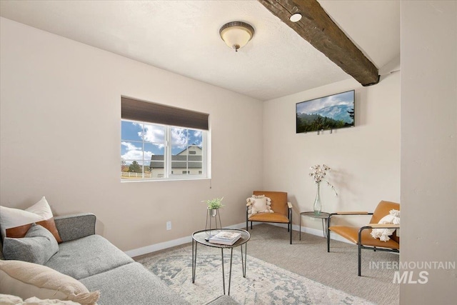 8618 Latimore Ln, Middleton, ID 83644 - carpeted living area featuring beam ceiling and baseboards