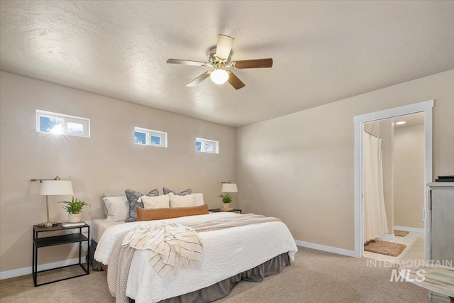 8618 Latimore Ln, Middleton, ID 83644 - bedroom featuring baseboards, light colored carpet, ceiling fan, and a textured ceiling