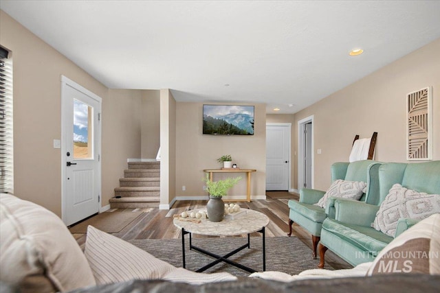 8618 Latimore Ln, Middleton, ID 83644 - living area with stairs, wood finished floors, baseboards, and recessed lighting