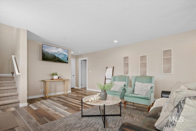 8618 Latimore Ln, Middleton, ID 83644 - living area featuring wood finished floors, stairway, baseboards, and recessed lighting