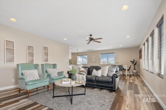 8618 Latimore Ln, Middleton, ID 83644 - living area with wood finished floors, ceiling fan, recessed lighting, and baseboards