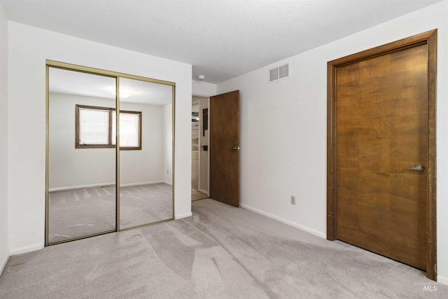 1719 S Gekeler Ln, Boise, ID 83706 - unfurnished bedroom with carpet floors, a closet, and baseboards