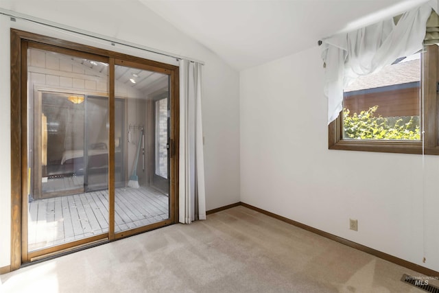 1719 S Gekeler Ln, Boise, ID 83706 - unfurnished room with lofted ceiling, light colored carpet, and baseboards