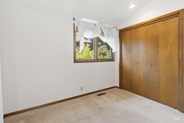 1719 S Gekeler Ln, Boise, ID 83706 - unfurnished bedroom with vaulted ceiling, carpet flooring, baseboards, a closet, and recessed lighting