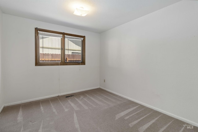 1719 S Gekeler Ln, Boise, ID 83706 - spare room with carpet floors and baseboards