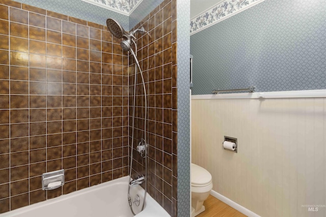 1719 S Gekeler Ln, Boise, ID 83706 - bathroom featuring wallpapered walls, toilet, wainscoting, and washtub / shower combination