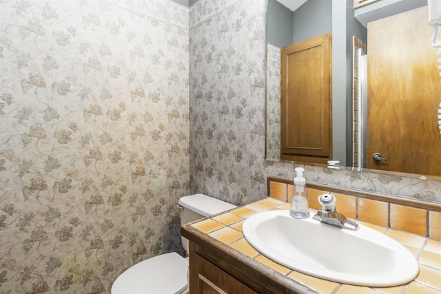 1719 S Gekeler Ln, Boise, ID 83706 - half bathroom with vanity and toilet