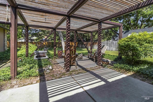 1719 S Gekeler Ln, Boise, ID 83706 - fenced backyard with a pergola and a patio area