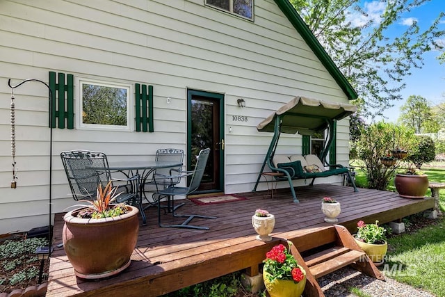 10838 W Southerland St, Boise, ID 83709 - wooden deck with outdoor dining space