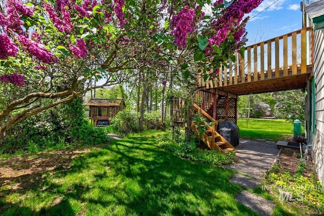 10838 W Southerland St, Boise, ID 83709 - view of yard with a wooden deck and stairway
